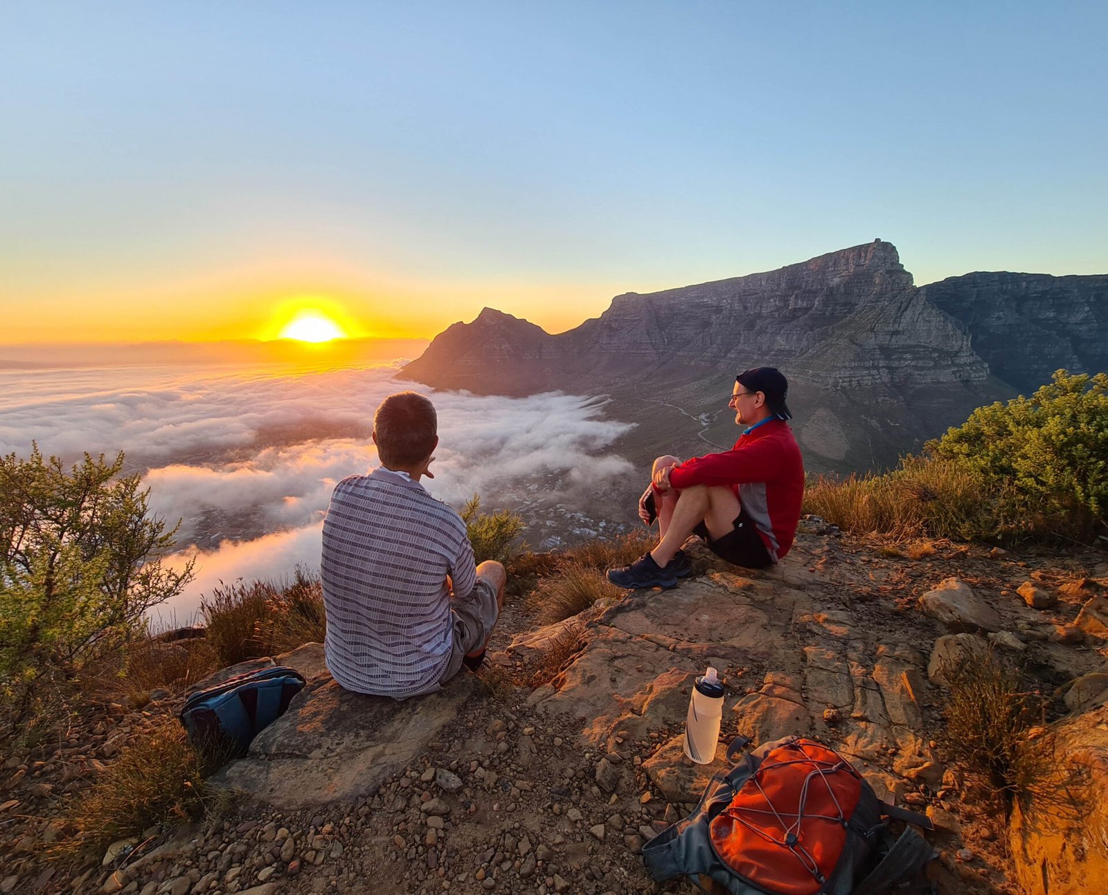 hikers at sunrise on table mountain